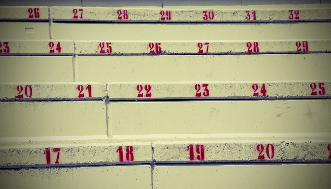 numbers on the stairs in the stadium to indicate the seat Immagine